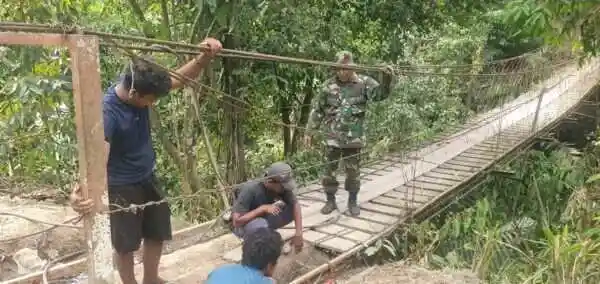TNI AD Rampungkan Rehab Jembatan Gantung Halimbe, Akses Warga Labura Kembali Lancar